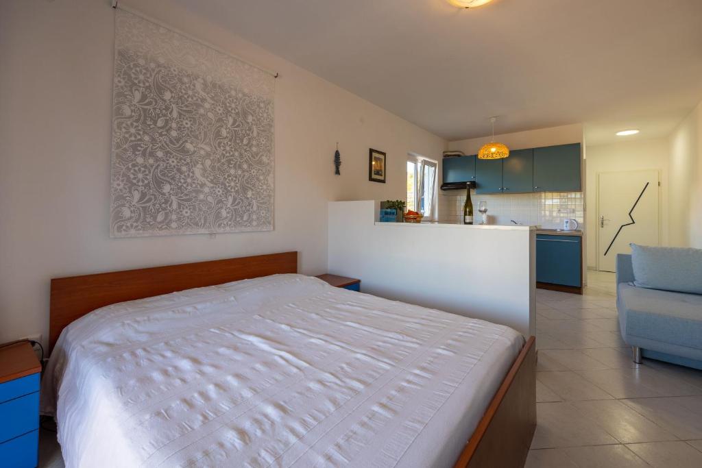Posteľ alebo postele v izbe v ubytovaní Apartments Perfect place