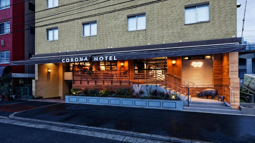 a hotel with a pig in the front of a building at Osaka Corona Hotel in Osaka