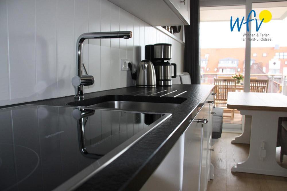 Kuchyň nebo kuchyňský kout v ubytování Achterhus - Ferienwohnung Inseltraum