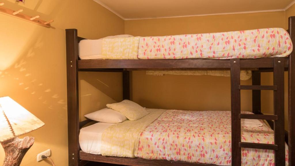 Postel nebo postele na pokoji v ubytování Beraja Family Hostel