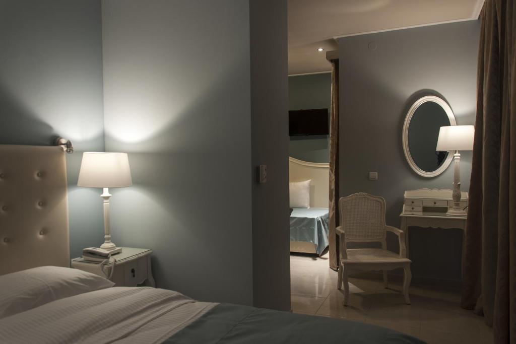 Postel nebo postele na pokoji v ubytování Hotel Marianna