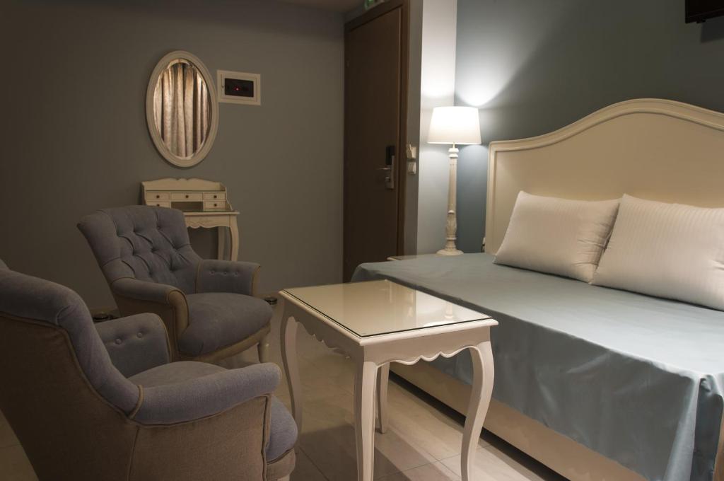 Postel nebo postele na pokoji v ubytování Hotel Marianna