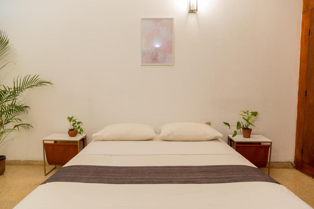 Postel nebo postele na pokoji v ubytování Greenscape Colombo