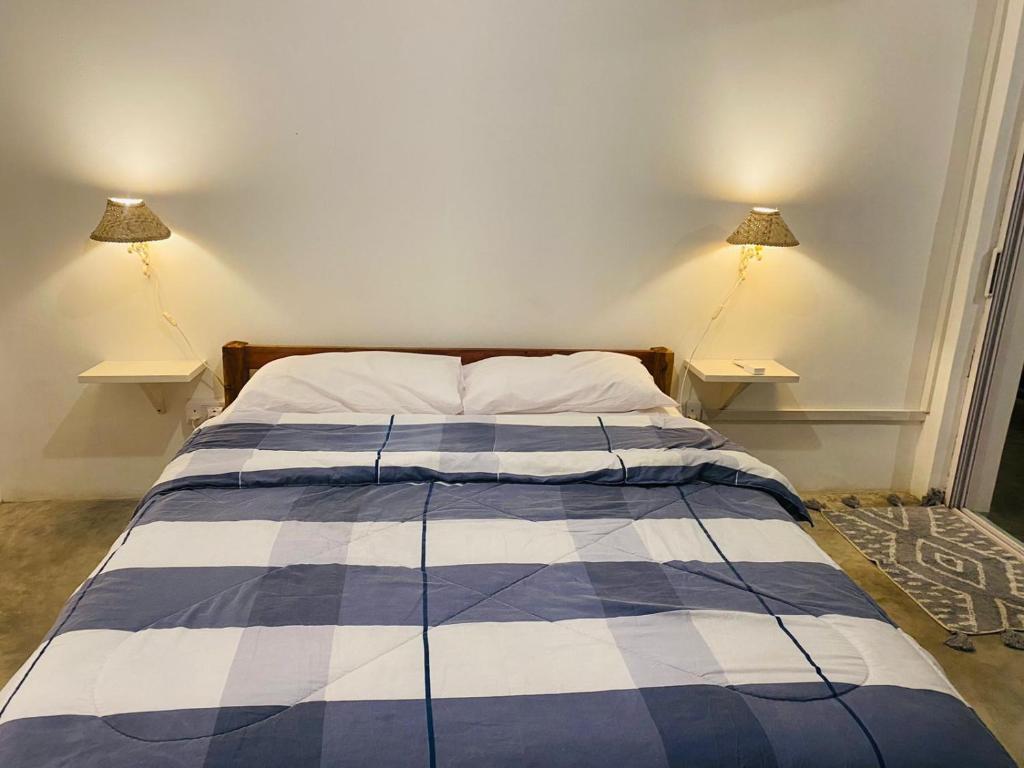 Postel nebo postele na pokoji v ubytování Kite Room