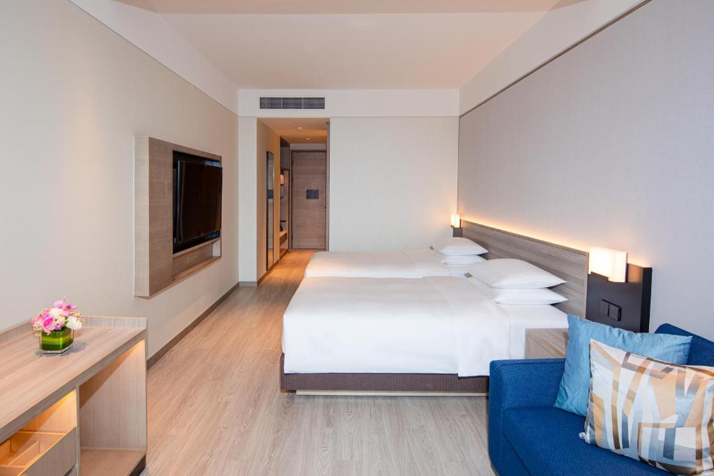 Hyatt Place Hangzhou International Airportにあるベッド