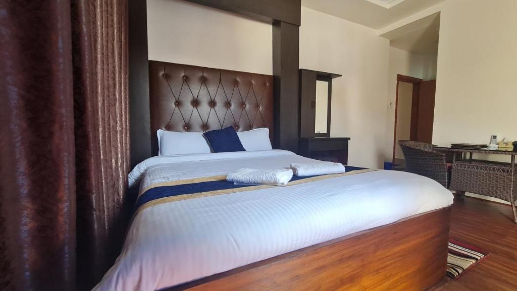 Postel nebo postele na pokoji v ubytování Dream Palace Resort
