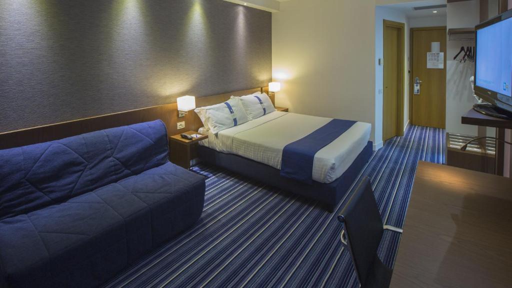 Posteľ alebo postele v izbe v ubytovaní GP Hotel