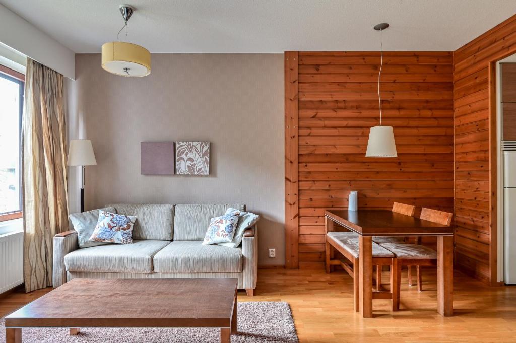 Posezení v ubytování Ylläs Saaga Ski Chalets 2