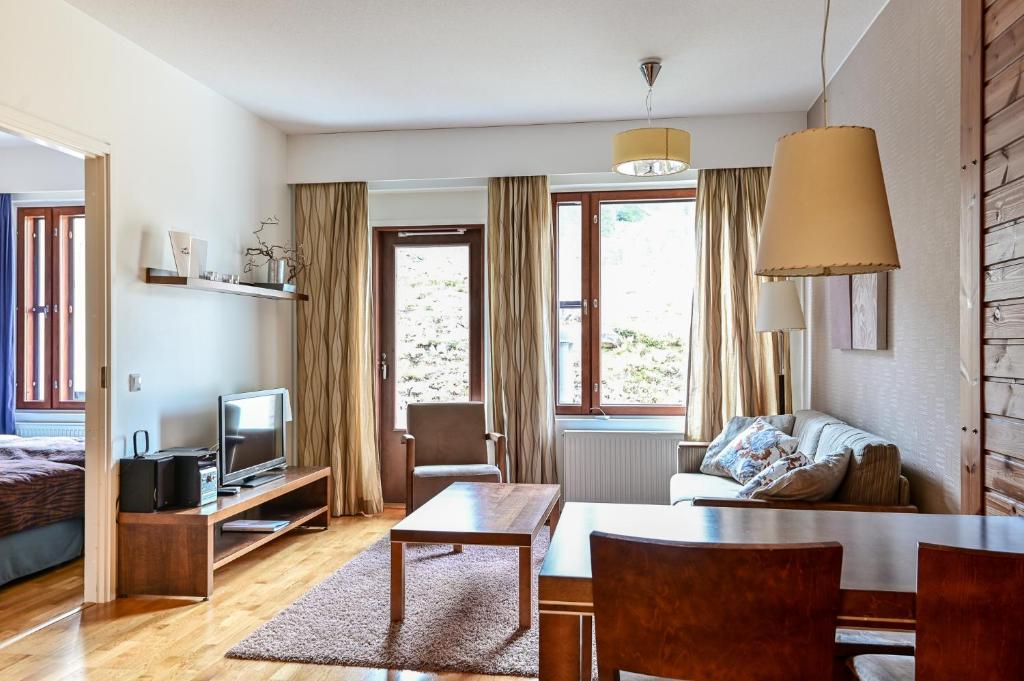 Posezení v ubytování Ylläs Saaga Ski Chalets 2