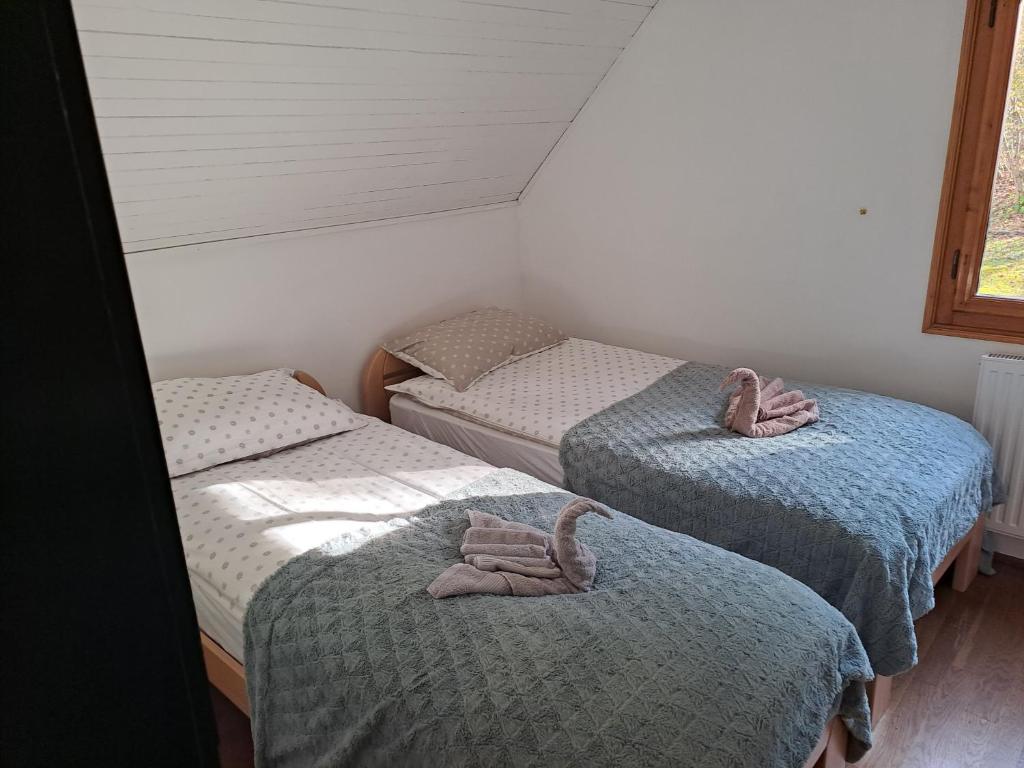 Postel nebo postele na pokoji v ubytování Bohinj, Metka - vacation house Pri Metki