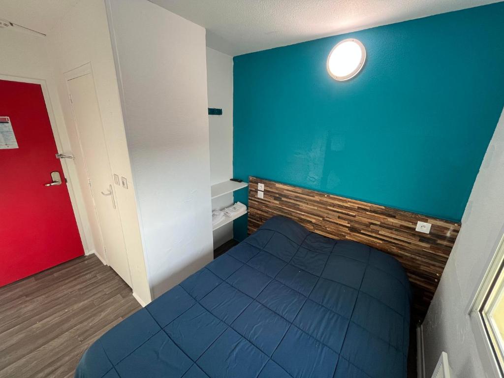 Postel nebo postele na pokoji v ubytování Hôtel Eco Blois -Sud- Vineuil