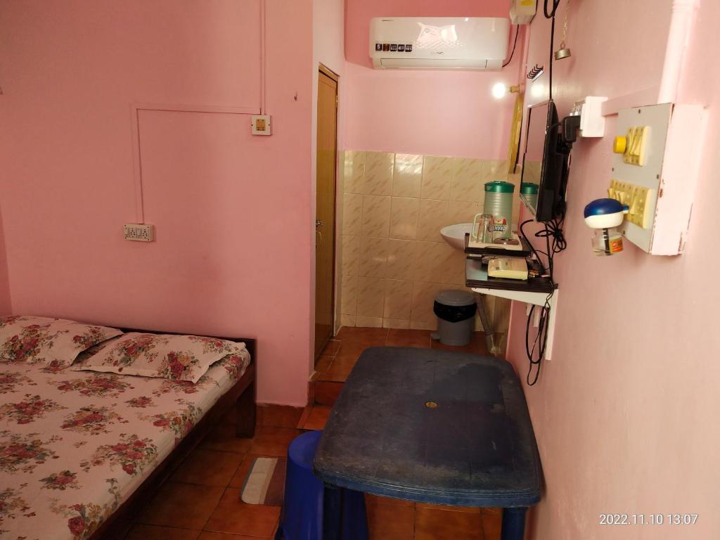 Postel nebo postele na pokoji v ubytování AMINA LODGE