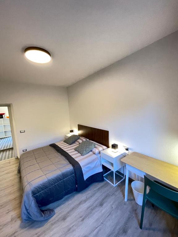 Łóżko lub łóżka w pokoju w obiekcie Smart Silver Apartment Central