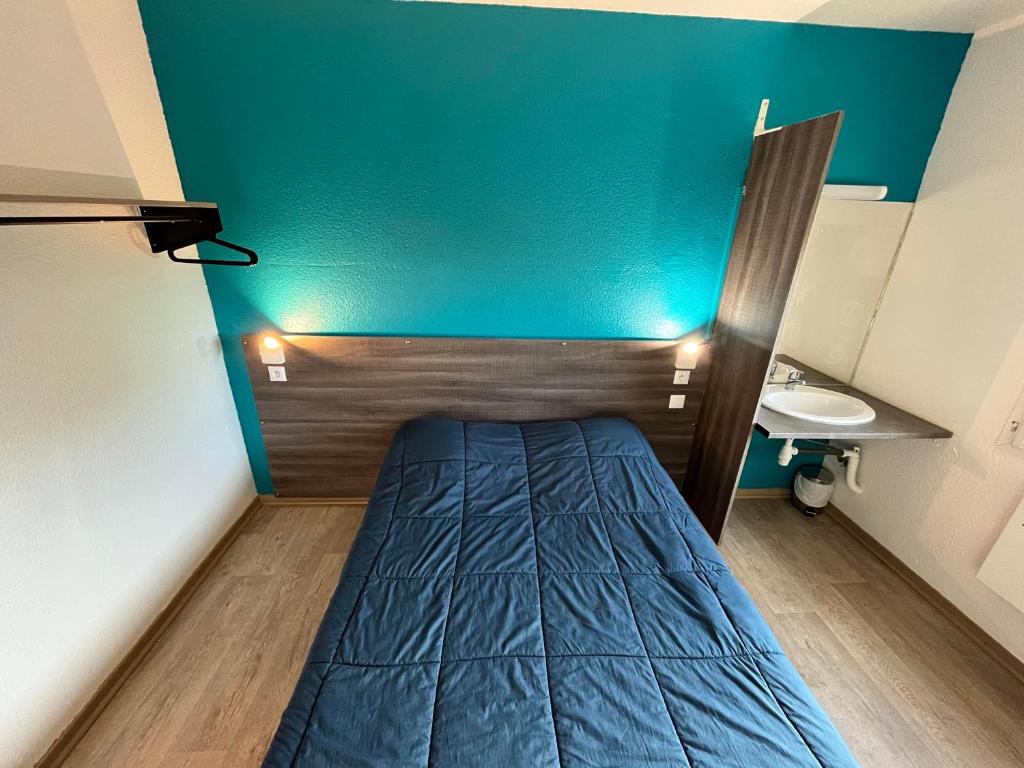 Postel nebo postele na pokoji v ubytování Hôtel Eco Blois -Sud- Vineuil