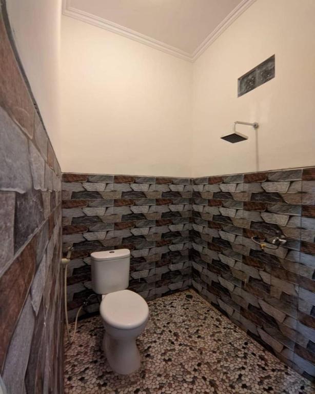 Koupelna v ubytování Calliandra Homestay