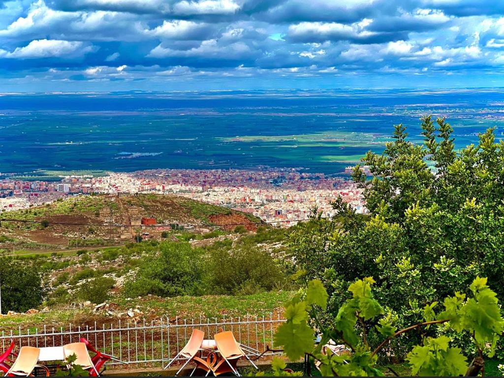 a view of a city from the top of a hill at maison d'hôtes yamine in Beni Mellal