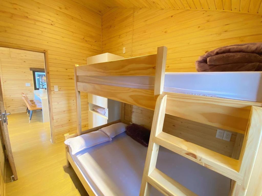 Giường trong phòng chung tại Ngọc Nguyên Homestay
