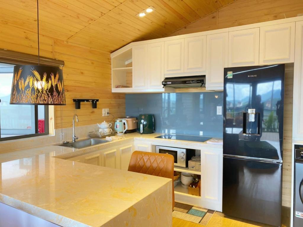 Kuchyň nebo kuchyňský kout v ubytování Ngọc Nguyên Homestay