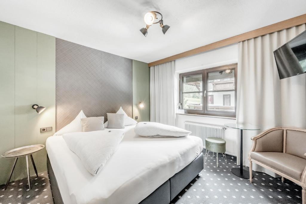 Posteľ alebo postele v izbe v ubytovaní Corso`s Annabell - Bed & Breakfast