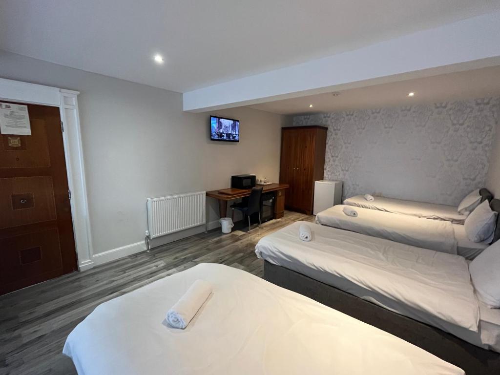 Postel nebo postele na pokoji v ubytování Park View Rooms
