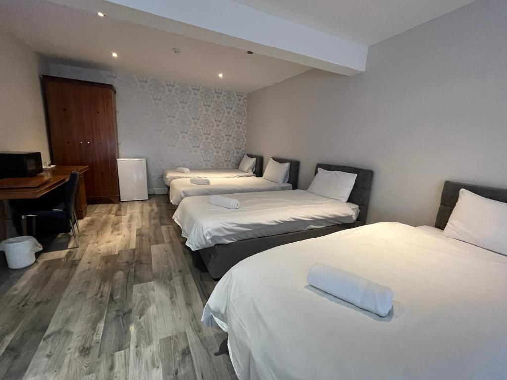 Postel nebo postele na pokoji v ubytování Park View Rooms