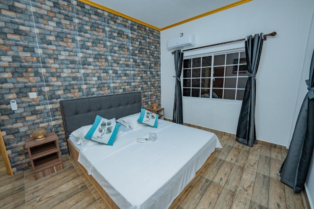 Postel nebo postele na pokoji v ubytování Paradise Breeze Apartment
