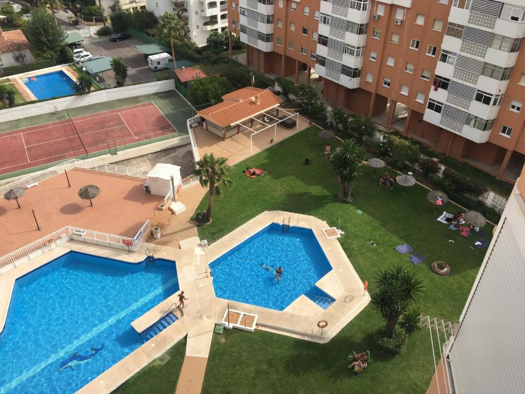 Bazén v ubytování Bright studio apt. with sea view and pool nebo v jeho okolí