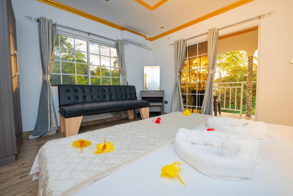 Postel nebo postele na pokoji v ubytování Paradise Breeze Apartment