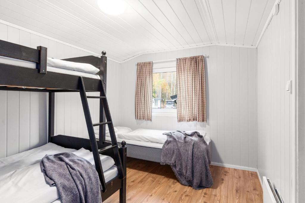 Postel nebo postele na pokoji v ubytování Topcamp Rustberg - Hafjell