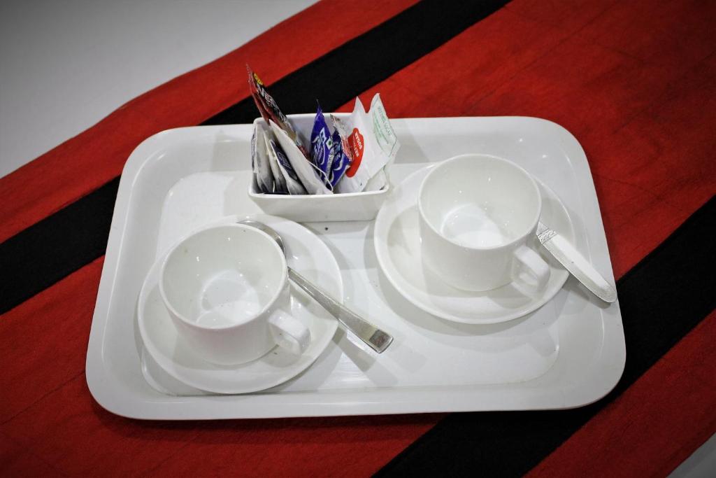 Příslušenství pro přípravu čaje a kávy v ubytování Reliable Inn