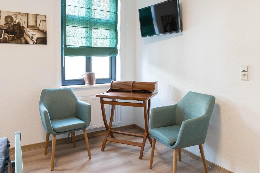 TV a/nebo společenská místnost v ubytování Hotel Alte Färberei