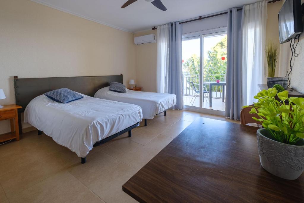 Posteľ alebo postele v izbe v ubytovaní Deauville Miami platja