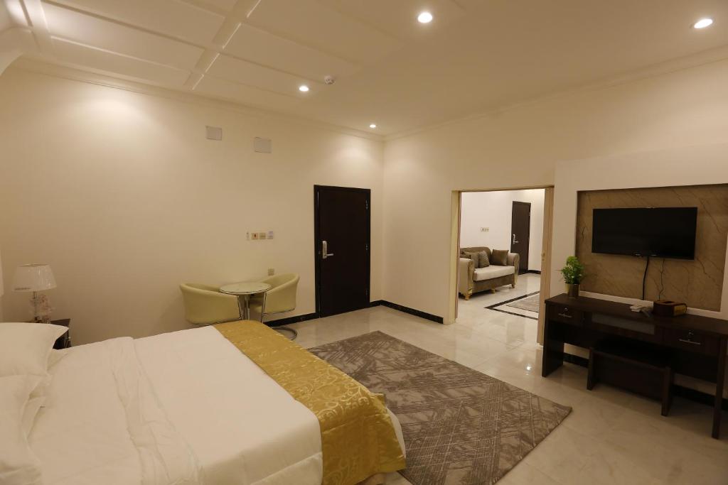 Postel nebo postele na pokoji v ubytování فندق حصن الأبلق - Alablaq Hotel