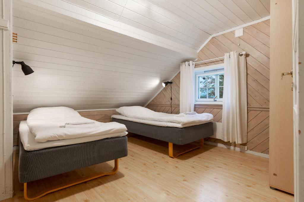 Postel nebo postele na pokoji v ubytování Topcamp Rustberg - Hafjell