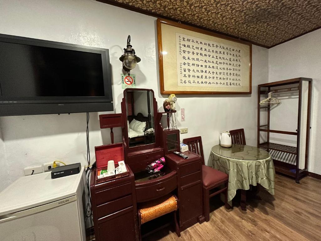 TV a/nebo společenská místnost v ubytování Ming Ren Hotspring Hotel