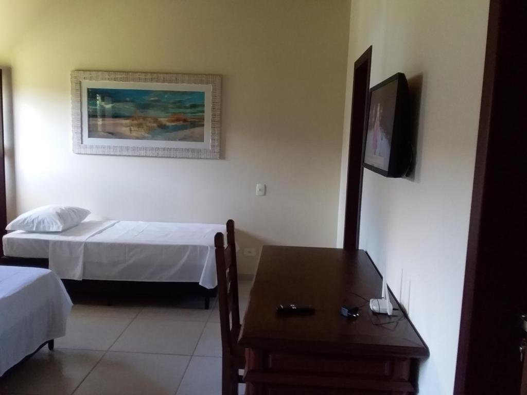 Postel nebo postele na pokoji v ubytování Residencial Seestern - Suítes