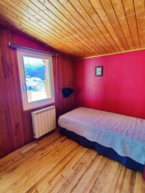 Posteľ alebo postele v izbe v ubytovaní Chalet Ailleurs Appartement à Molines en Queyras