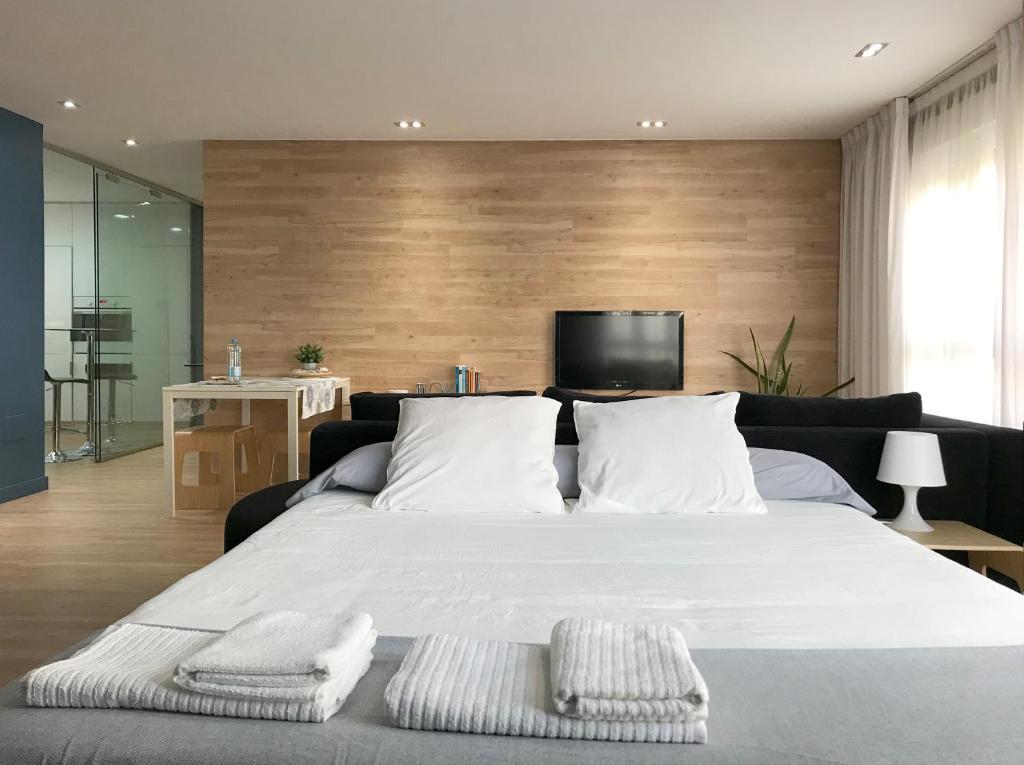 Postel nebo postele na pokoji v ubytování Al_reparo Home Beach _ Adra