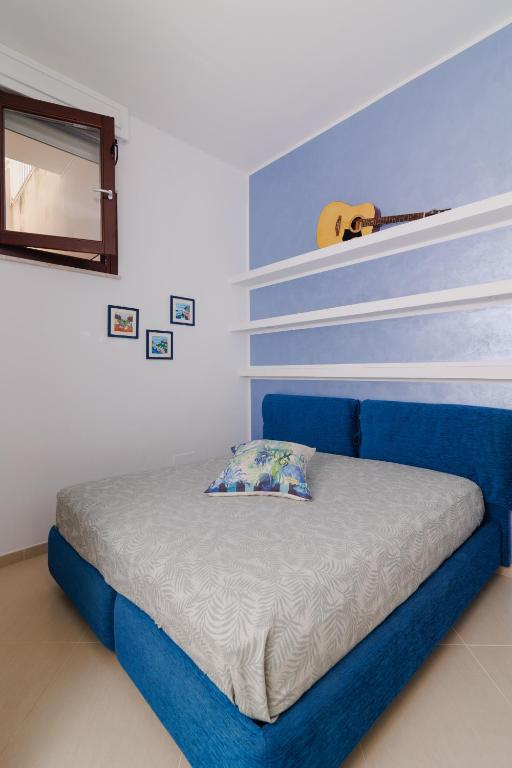A bed or beds in a room at Leukasia