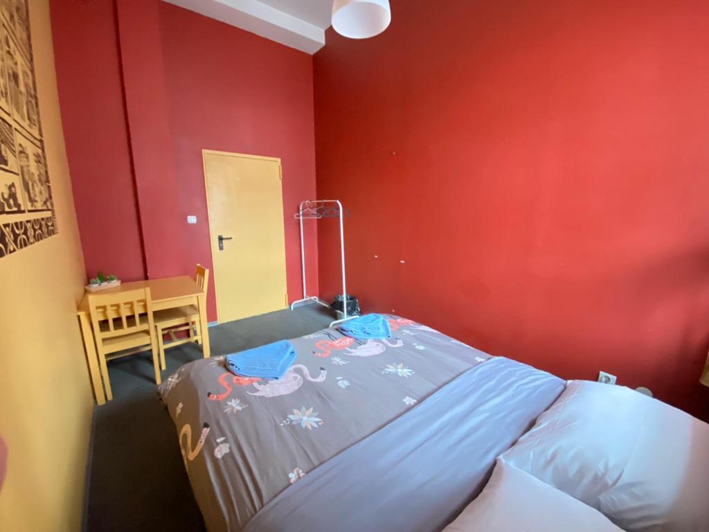 Posteľ alebo postele v izbe v ubytovaní Oliwka Hostel
