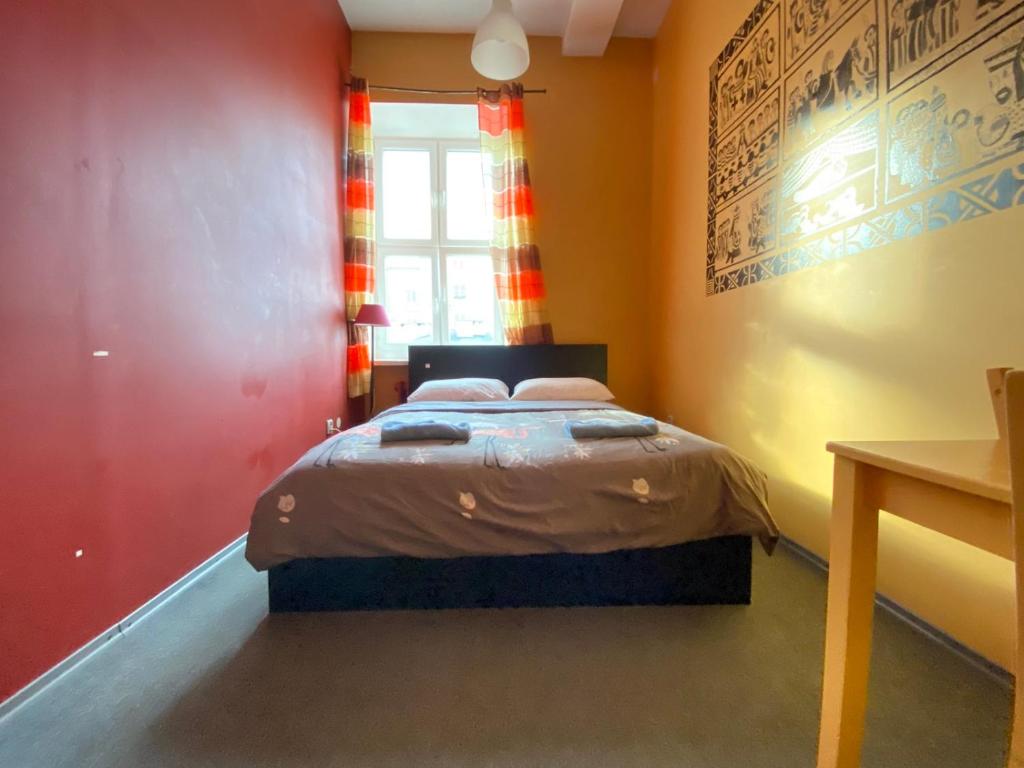 Posteľ alebo postele v izbe v ubytovaní Oliwka Hostel
