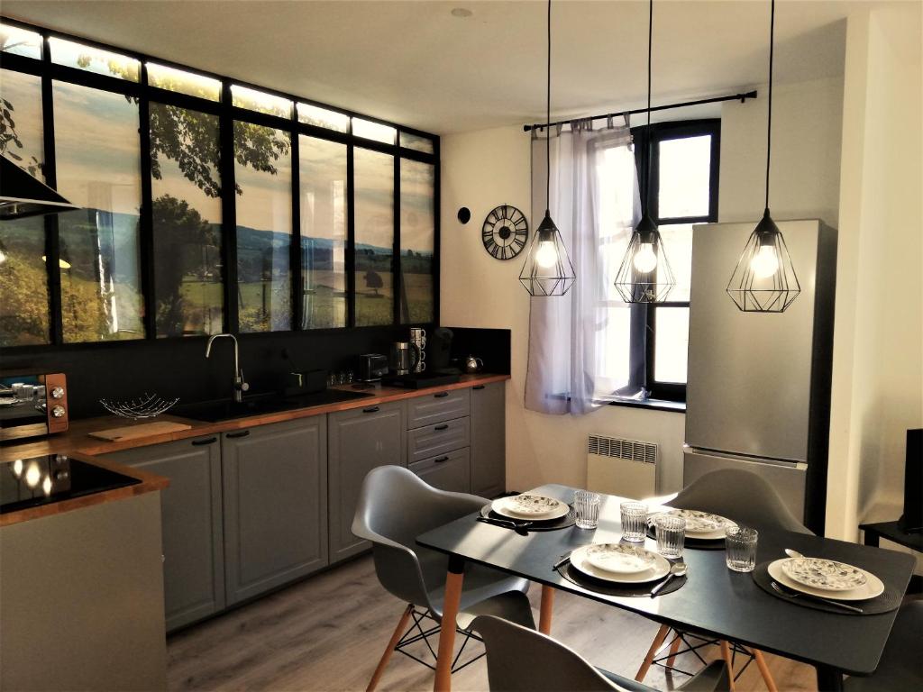 Kuchyň nebo kuchyňský kout v ubytování Appartement sous les remparts