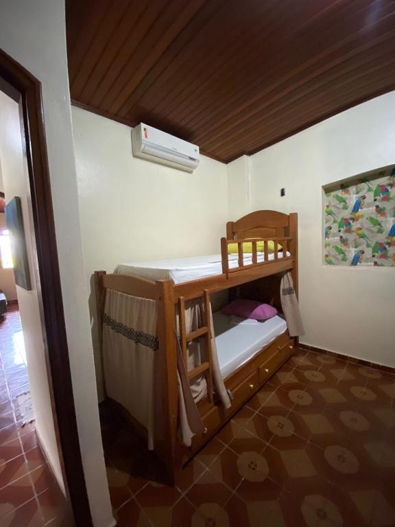 Postel nebo postele na pokoji v ubytování Hostel Roraima
