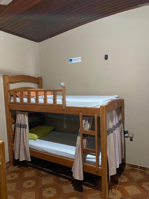 Postel nebo postele na pokoji v ubytování Hostel Roraima