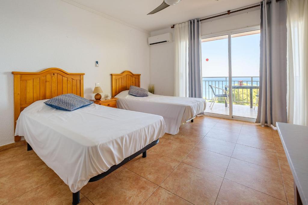 Posteľ alebo postele v izbe v ubytovaní Deauville Miami platja