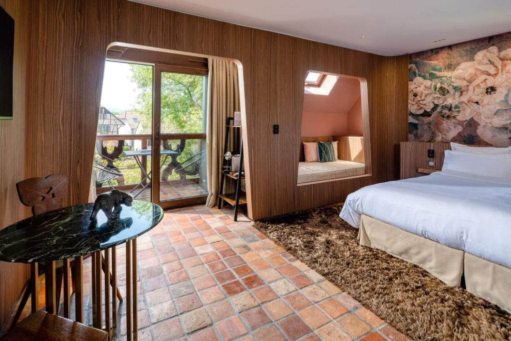 Postel nebo postele na pokoji v ubytování Hotel des Berges, Restaurant Gastronomique & Spa