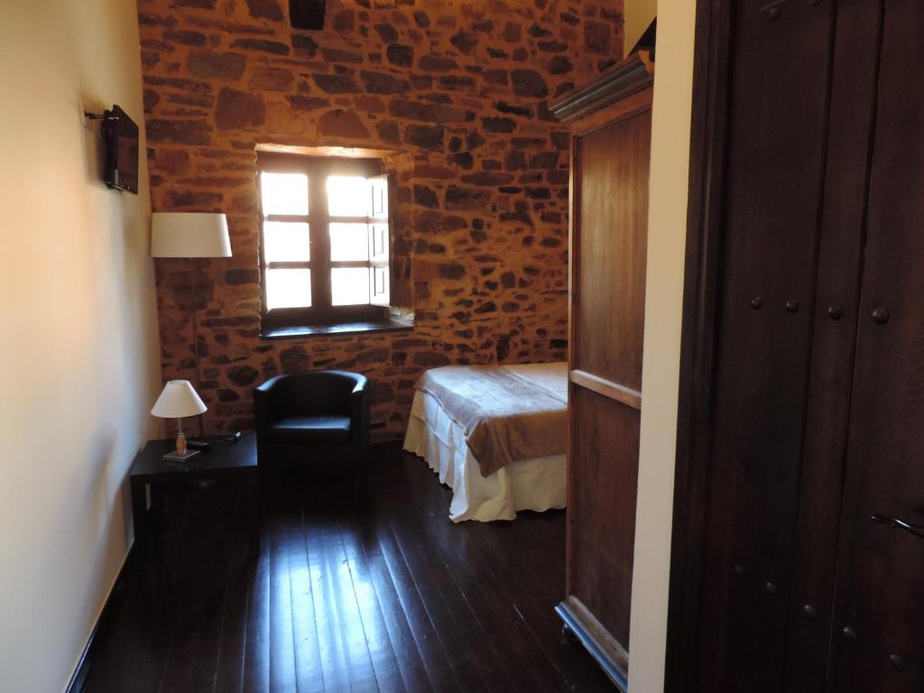 Cama o camas de una habitación en El Rincón Maragato