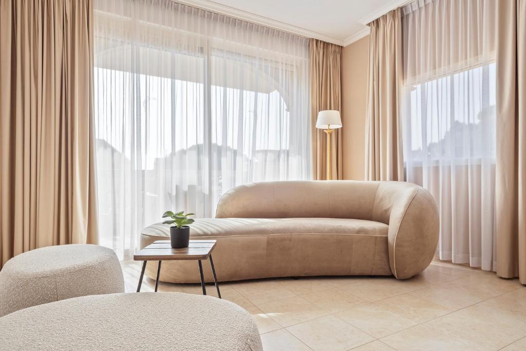 Posezení v ubytování Van der Valk Hotel Barcarola