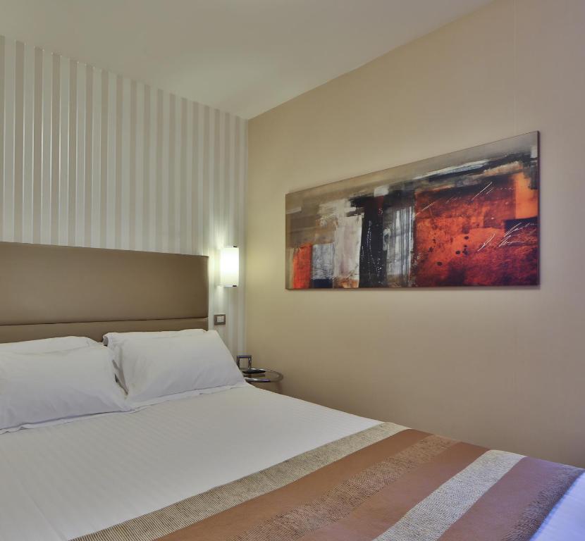 Postel nebo postele na pokoji v ubytování Best Western Hotel Piccadilly