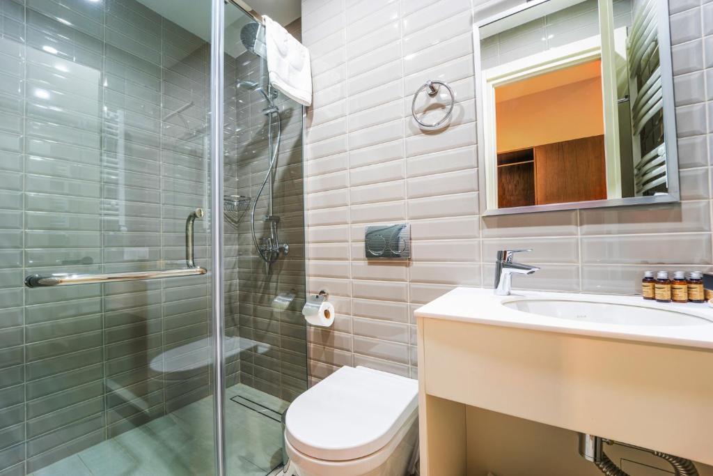 Koupelna v ubytování Makmani Boutique Hotel by DNT Group